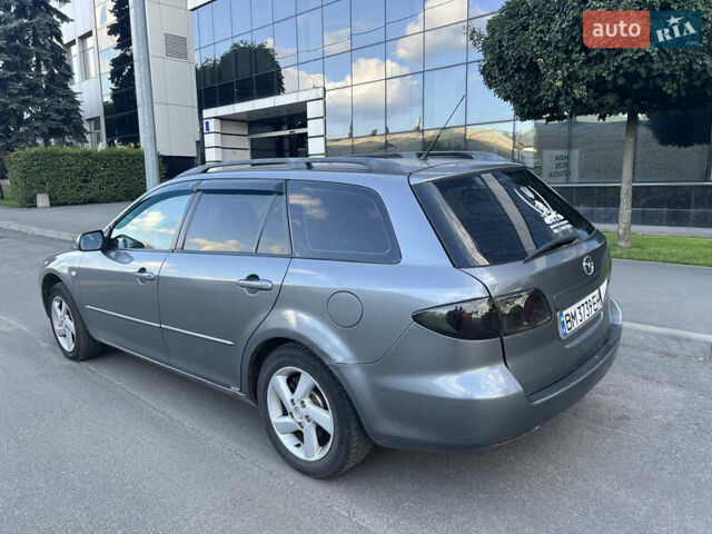Серый Мазда 6, объемом двигателя 2 л и пробегом 340 тыс. км за 3300 $, фото 2 на Automoto.ua