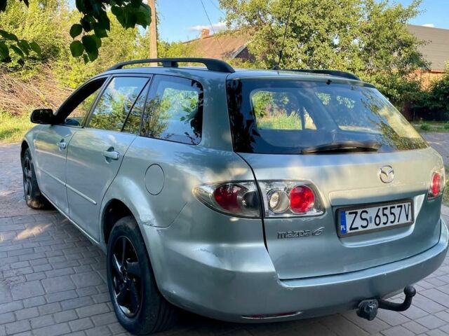Серый Мазда 6, объемом двигателя 2 л и пробегом 300 тыс. км за 1850 $, фото 5 на Automoto.ua