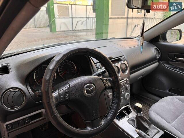 Серый Мазда 6, объемом двигателя 2 л и пробегом 306 тыс. км за 3300 $, фото 7 на Automoto.ua