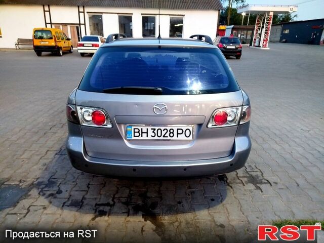 Серый Мазда 6, объемом двигателя 2 л и пробегом 250 тыс. км за 2850 $, фото 4 на Automoto.ua