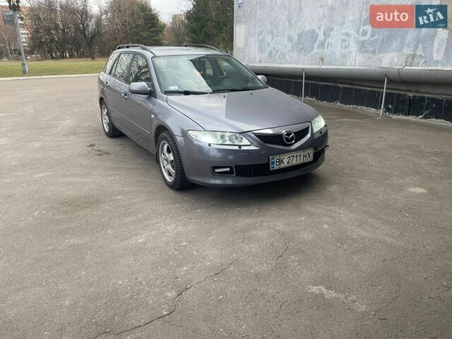 Серый Мазда 6, объемом двигателя 2 л и пробегом 304 тыс. км за 3700 $, фото 1 на Automoto.ua