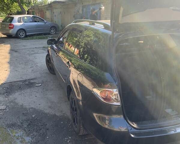 Серый Мазда 6, объемом двигателя 2 л и пробегом 294 тыс. км за 5500 $, фото 12 на Automoto.ua