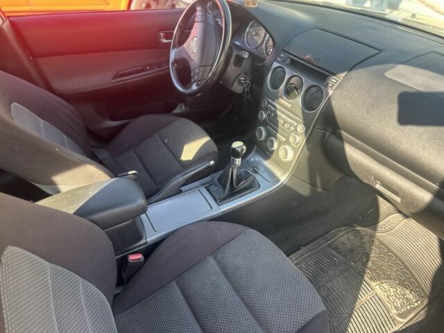 Серый Мазда 6, объемом двигателя 2 л и пробегом 280 тыс. км за 1600 $, фото 6 на Automoto.ua