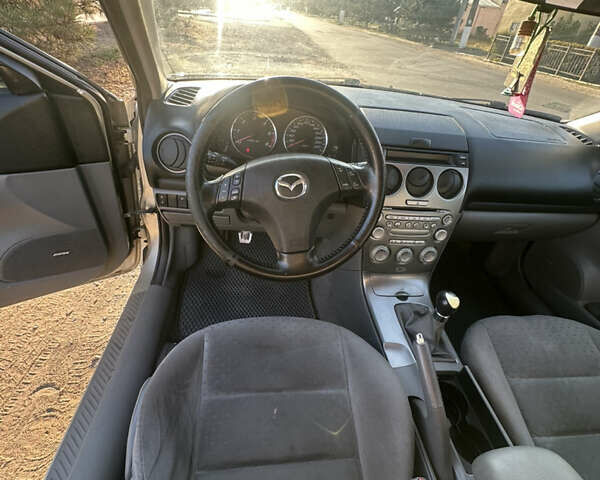 Сірий Мазда 6, об'ємом двигуна 2 л та пробігом 298 тис. км за 3400 $, фото 18 на Automoto.ua