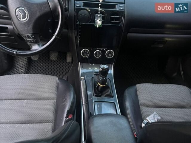Серый Мазда 6, объемом двигателя 2 л и пробегом 315 тыс. км за 3200 $, фото 4 на Automoto.ua