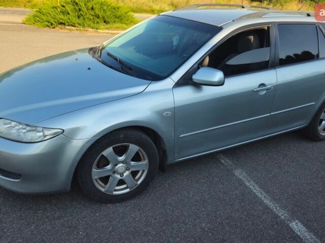 Сірий Мазда 6, об'ємом двигуна 2 л та пробігом 300 тис. км за 3900 $, фото 1 на Automoto.ua