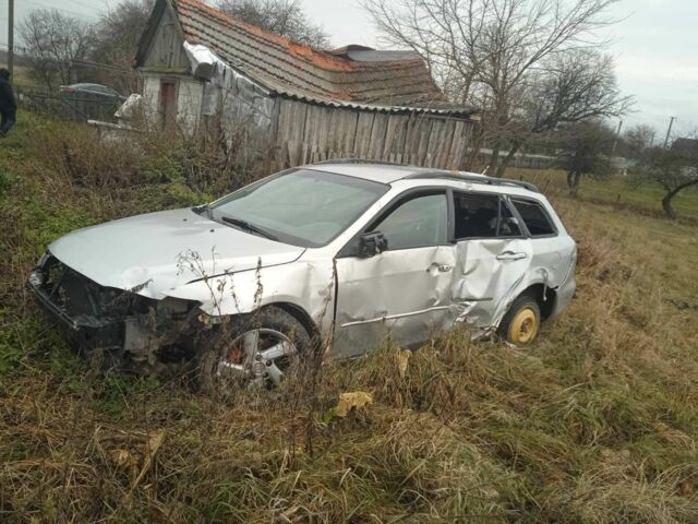 Серый Мазда 6, объемом двигателя 1.8 л и пробегом 200 тыс. км за 1111 $, фото 4 на Automoto.ua