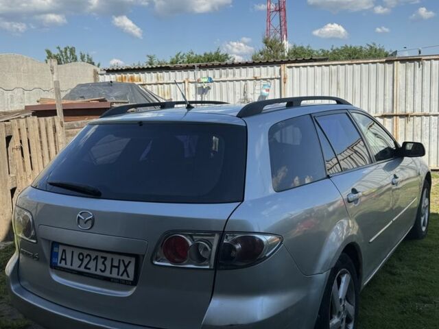 Серый Мазда 6, объемом двигателя 2 л и пробегом 286 тыс. км за 2911 $, фото 2 на Automoto.ua