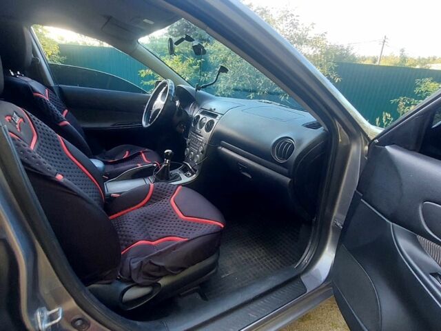Сірий Мазда 6, об'ємом двигуна 2 л та пробігом 585 тис. км за 3400 $, фото 7 на Automoto.ua