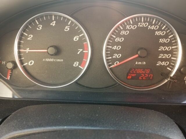 Серый Мазда 6, объемом двигателя 1.8 л и пробегом 229 тыс. км за 4200 $, фото 7 на Automoto.ua