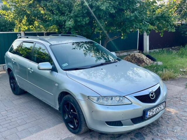 Серый Мазда 6, объемом двигателя 2 л и пробегом 300 тыс. км за 1850 $, фото 1 на Automoto.ua