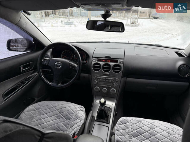 Серый Мазда 6, объемом двигателя 2 л и пробегом 250 тыс. км за 3500 $, фото 9 на Automoto.ua