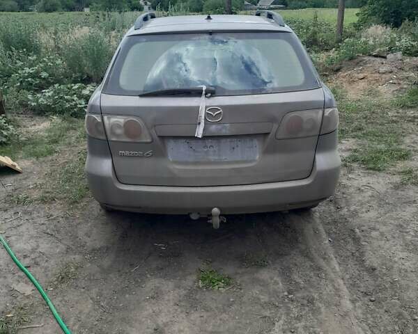 Серый Мазда 6, объемом двигателя 2 л и пробегом 250 тыс. км за 1700 $, фото 2 на Automoto.ua
