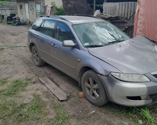 Серый Мазда 6, объемом двигателя 2 л и пробегом 250 тыс. км за 1700 $, фото 1 на Automoto.ua