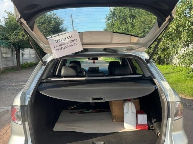 Серый Мазда 6, объемом двигателя 2 л и пробегом 344 тыс. км за 4000 $, фото 4 на Automoto.ua