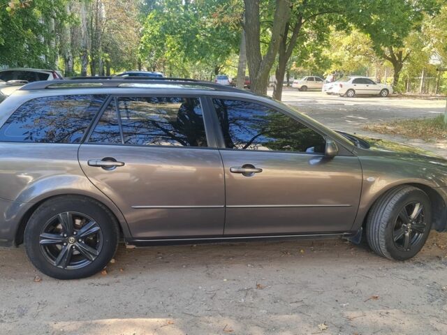 Серый Мазда 6, объемом двигателя 2 л и пробегом 300 тыс. км за 5300 $, фото 1 на Automoto.ua