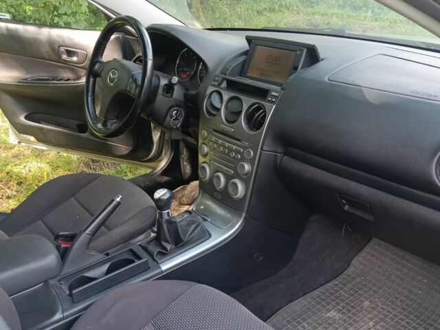Серый Мазда 6, объемом двигателя 2 л и пробегом 248 тыс. км за 3000 $, фото 4 на Automoto.ua
