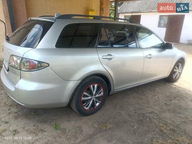 Сірий Мазда 6, об'ємом двигуна 2 л та пробігом 237 тис. км за 4700 $, фото 5 на Automoto.ua