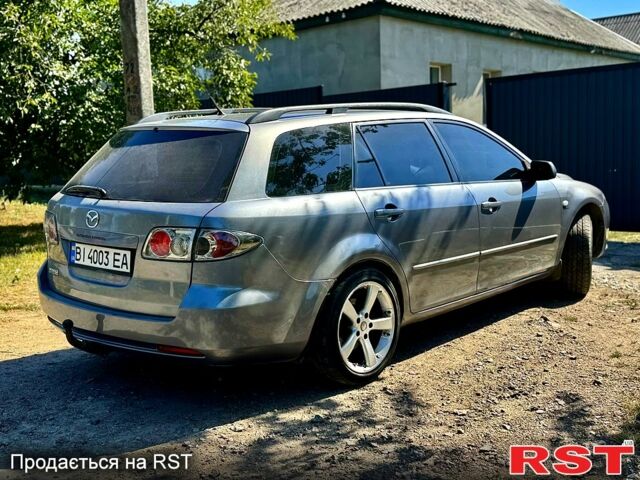 Сірий Мазда 6, об'ємом двигуна 1.8 л та пробігом 200 тис. км за 4999 $, фото 2 на Automoto.ua