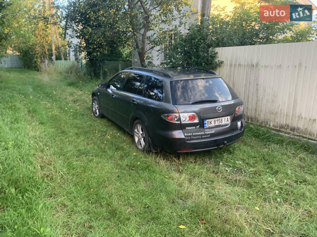 Серый Мазда 6, объемом двигателя 2 л и пробегом 302 тыс. км за 3400 $, фото 1 на Automoto.ua