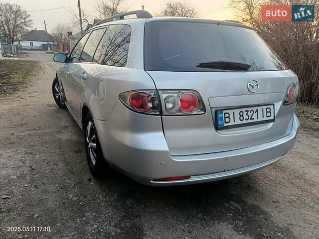 Сірий Мазда 6, об'ємом двигуна 2 л та пробігом 237 тис. км за 4700 $, фото 4 на Automoto.ua