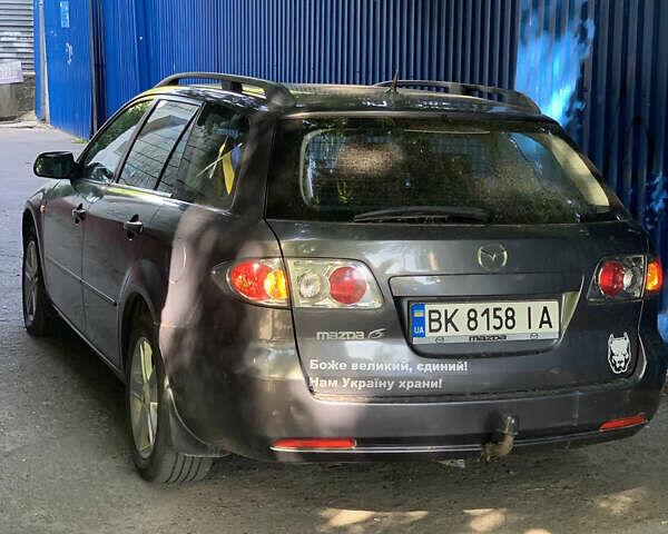 Серый Мазда 6, объемом двигателя 2 л и пробегом 302 тыс. км за 3400 $, фото 2 на Automoto.ua