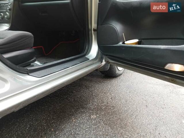 Серый Мазда 6, объемом двигателя 2 л и пробегом 357 тыс. км за 3600 $, фото 12 на Automoto.ua