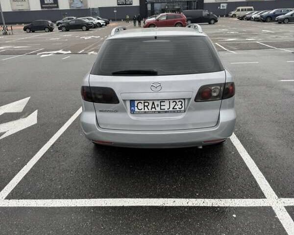 Серый Мазда 6, объемом двигателя 2 л и пробегом 347 тыс. км за 1900 $, фото 3 на Automoto.ua