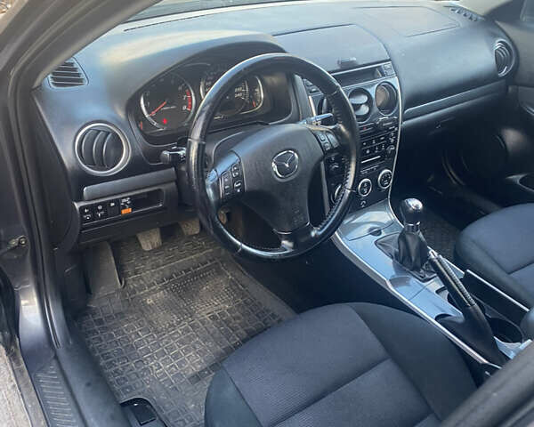 Серый Мазда 6, объемом двигателя 1.8 л и пробегом 300 тыс. км за 4000 $, фото 1 на Automoto.ua