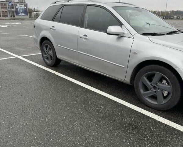 Серый Мазда 6, объемом двигателя 2 л и пробегом 347 тыс. км за 1900 $, фото 2 на Automoto.ua