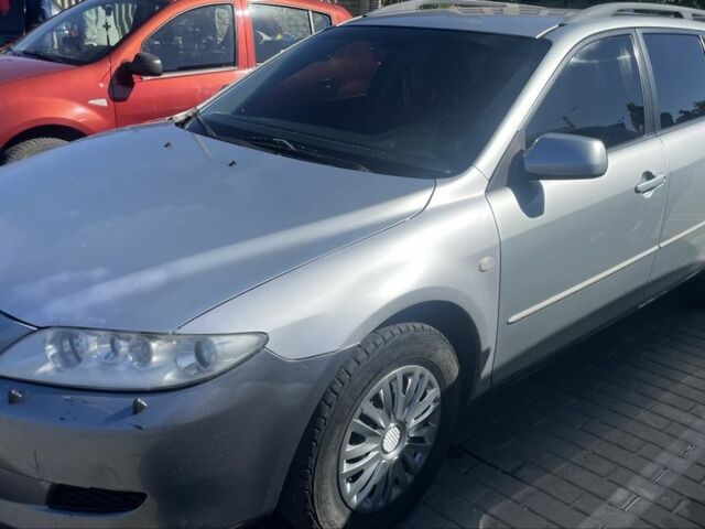 Серый Мазда 6, объемом двигателя 2 л и пробегом 300 тыс. км за 2000 $, фото 5 на Automoto.ua
