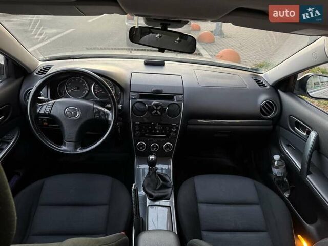 Серый Мазда 6, объемом двигателя 2 л и пробегом 245 тыс. км за 5700 $, фото 5 на Automoto.ua