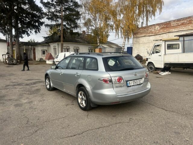 Серый Мазда 6, объемом двигателя 1.8 л и пробегом 413 тыс. км за 1850 $, фото 4 на Automoto.ua