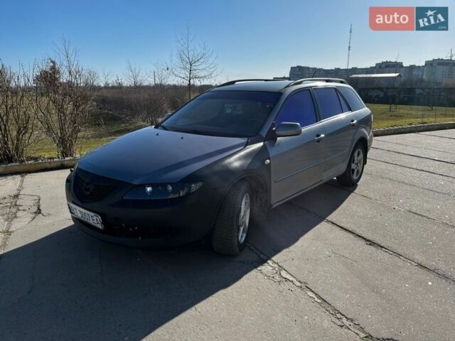 Серый Мазда 6, объемом двигателя 2 л и пробегом 336 тыс. км за 4000 $, фото 1 на Automoto.ua