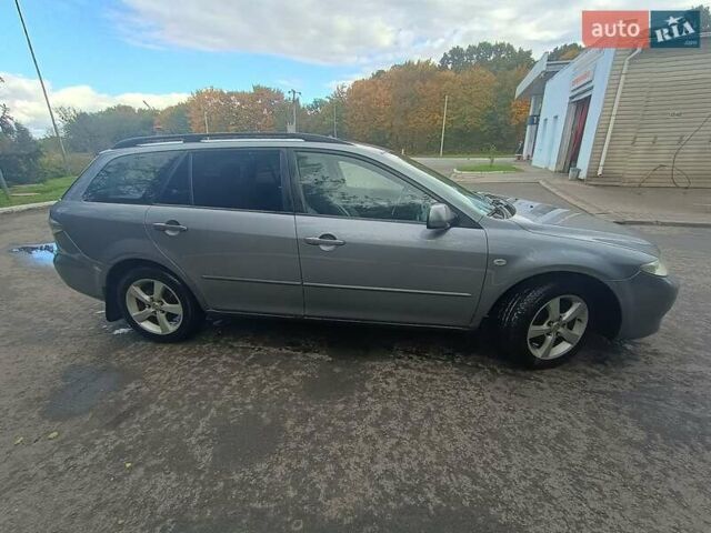 Серый Мазда 6, объемом двигателя 2 л и пробегом 364 тыс. км за 4400 $, фото 1 на Automoto.ua