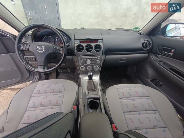 Серый Мазда 6, объемом двигателя 2 л и пробегом 364 тыс. км за 4400 $, фото 2 на Automoto.ua