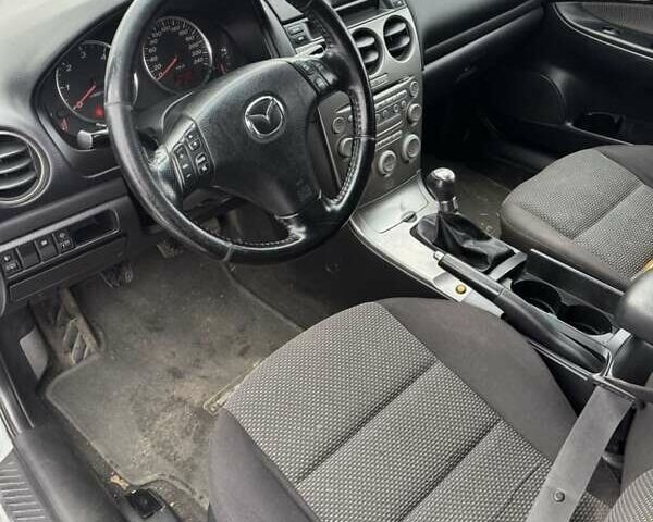 Серый Мазда 6, объемом двигателя 2 л и пробегом 347 тыс. км за 1900 $, фото 1 на Automoto.ua