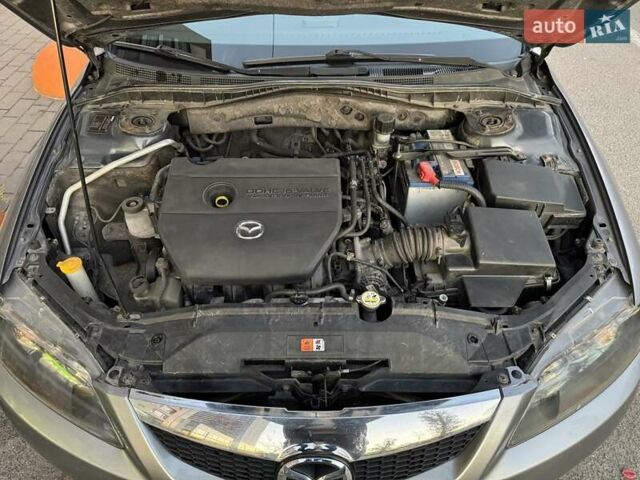 Серый Мазда 6, объемом двигателя 2 л и пробегом 245 тыс. км за 5700 $, фото 9 на Automoto.ua