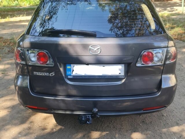 Сірий Мазда 6, об'ємом двигуна 2 л та пробігом 300 тис. км за 4600 $, фото 2 на Automoto.ua