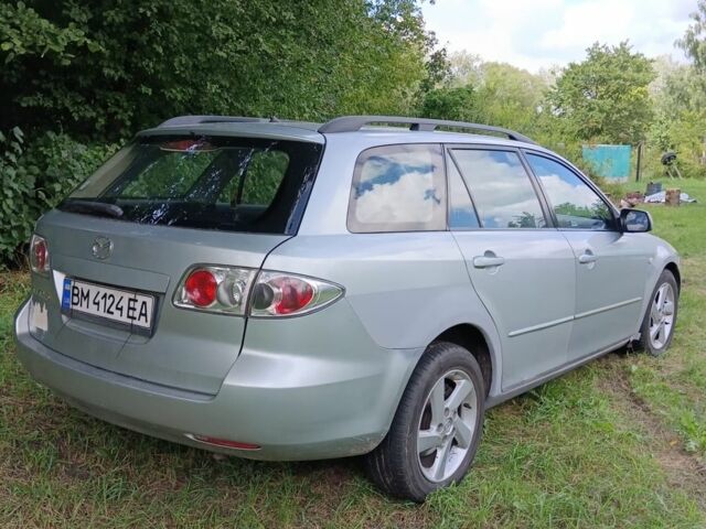 Серый Мазда 6, объемом двигателя 2 л и пробегом 248 тыс. км за 3000 $, фото 1 на Automoto.ua