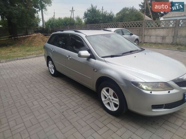 Серый Мазда 6, объемом двигателя 2 л и пробегом 350 тыс. км за 4800 $, фото 2 на Automoto.ua