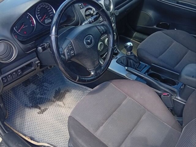 Серый Мазда 6, объемом двигателя 2 л и пробегом 237 тыс. км за 3200 $, фото 4 на Automoto.ua