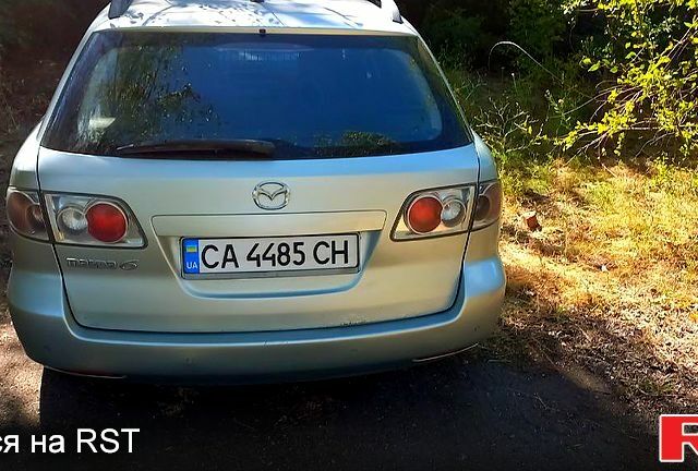 Серый Мазда 6, объемом двигателя 2 л и пробегом 314 тыс. км за 4500 $, фото 5 на Automoto.ua