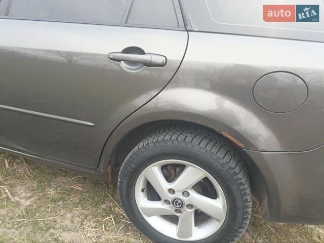 Серый Мазда 6, объемом двигателя 2 л и пробегом 263 тыс. км за 4500 $, фото 6 на Automoto.ua