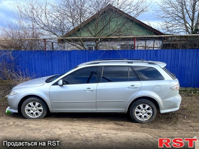 Серый Мазда 6, объемом двигателя 2 л и пробегом 300 тыс. км за 2600 $, фото 2 на Automoto.ua