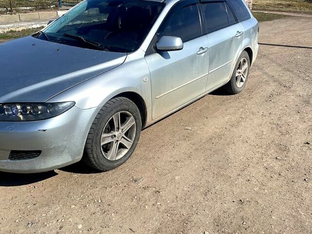 Серый Мазда 6, объемом двигателя 2 л и пробегом 320 тыс. км за 2100 $, фото 1 на Automoto.ua