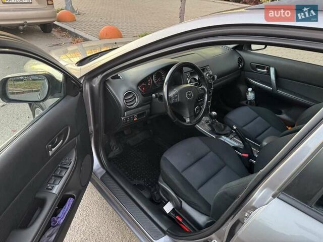 Серый Мазда 6, объемом двигателя 2 л и пробегом 245 тыс. км за 5700 $, фото 4 на Automoto.ua
