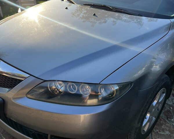 Серый Мазда 6, объемом двигателя 1.8 л и пробегом 217 тыс. км за 3999 $, фото 1 на Automoto.ua