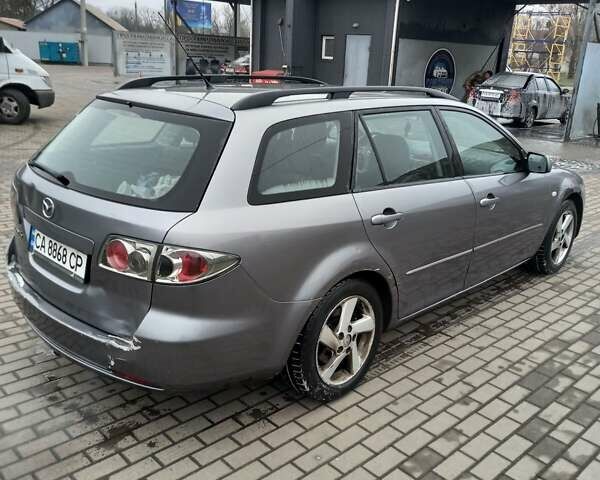 Серый Мазда 6, объемом двигателя 2 л и пробегом 360 тыс. км за 3500 $, фото 10 на Automoto.ua