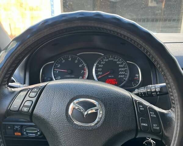 Серый Мазда 6, объемом двигателя 2 л и пробегом 230 тыс. км за 5000 $, фото 5 на Automoto.ua